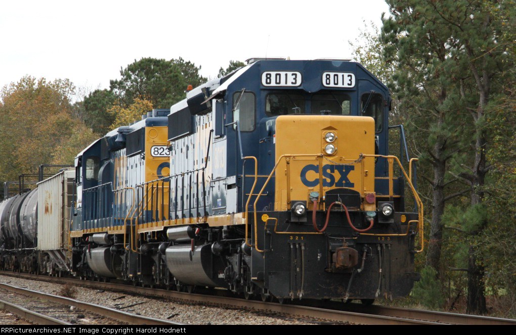 CSX 8013 sits in a siding